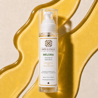 Opulence Melora dry body oil bottle on a yellow and beige background